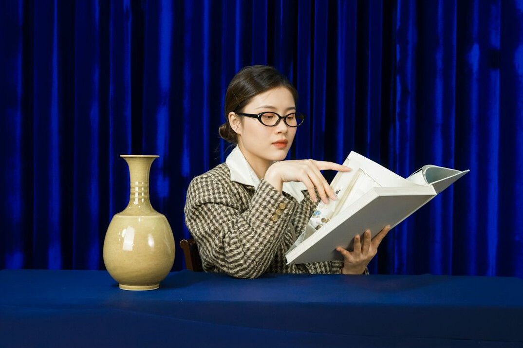 surprised reader with book
