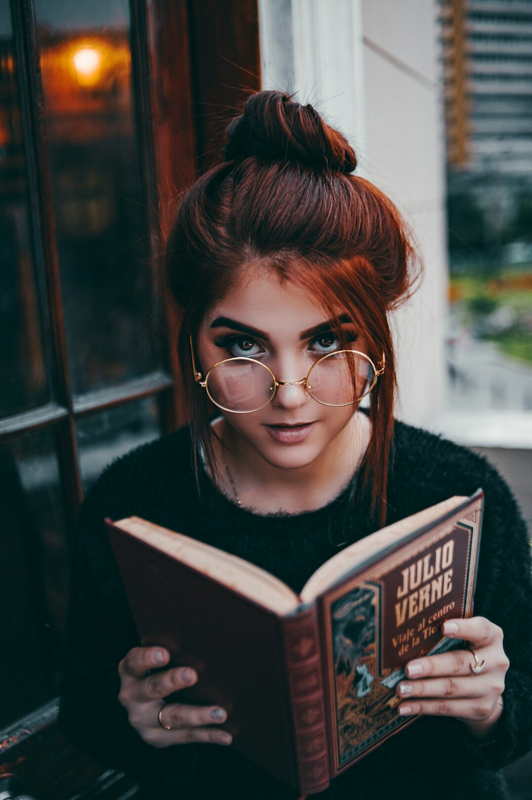 woman reading mystery book
